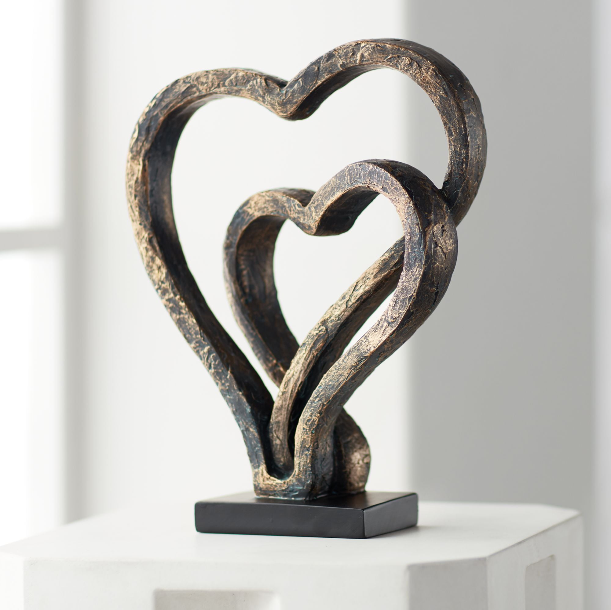 Aged Bronze Interlocking Hearts 12" Statue on Black Base