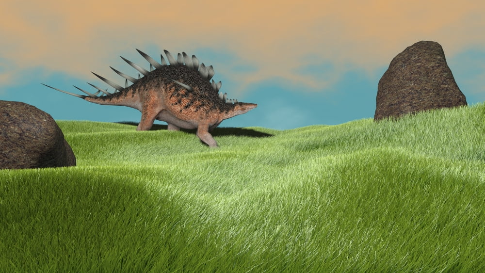 Kentrosaurus walking across prehistoric grasslands Canvas Art - Kostyantyn IvanyshenStocktrek Images (38 x 22)