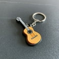 thumbnail image 1 of Keychain small gift gift small commodity silicone pendant soft rubber toy pvc doll key chain Versatile Usage - style：Classical guitar；, 1 of 5