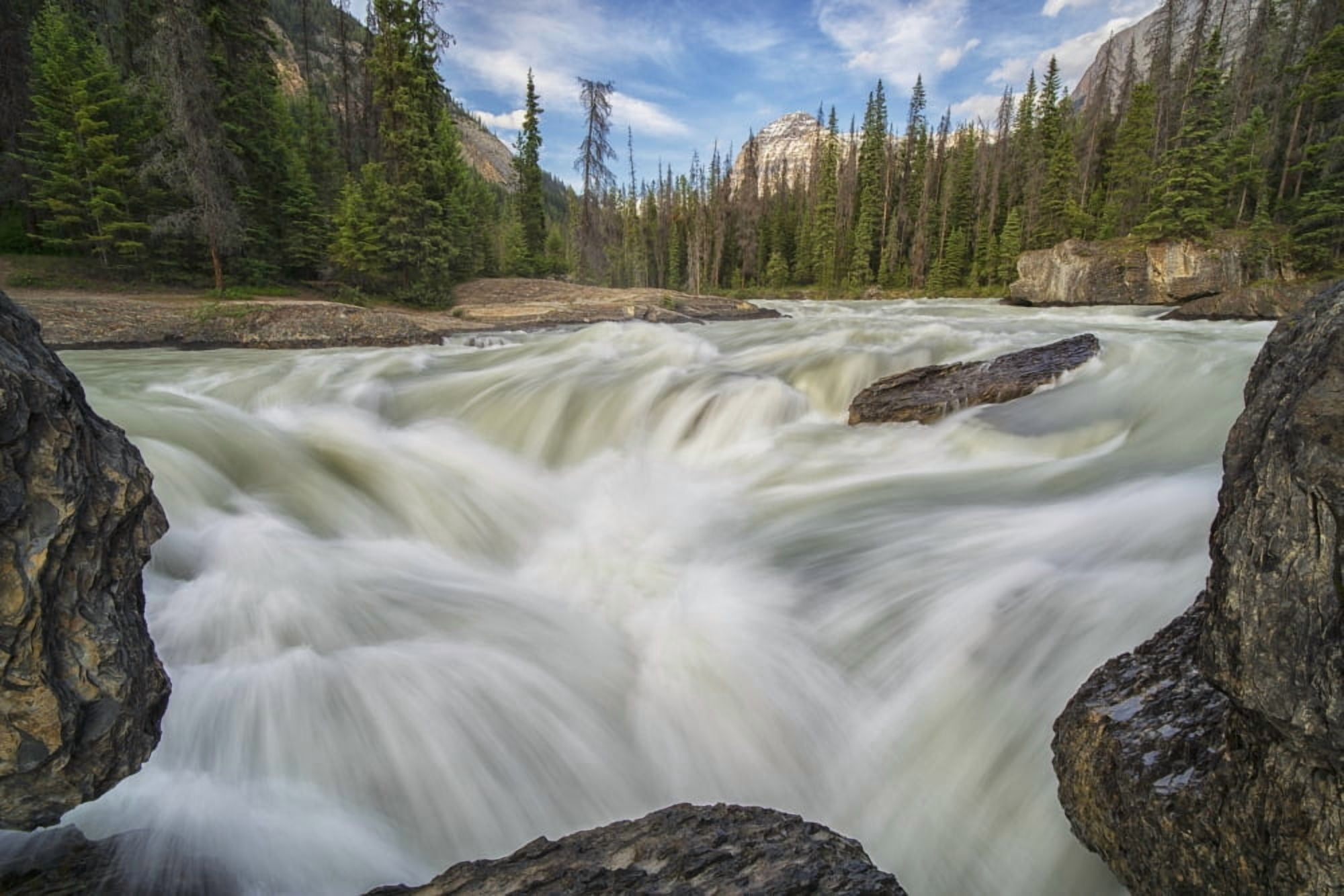 The Kicking Horse River flows over a waterfall before it goes beneath a natural bridge Yoho National Park British Columbia Canada Canvas Art - Robert Postma Design Pics (19 x 12)