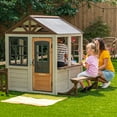 thumbnail image 1 of KidKraft Pioneer Cottage Wooden Playhouse with Doorbell and 13 Pieces, 1 of 10