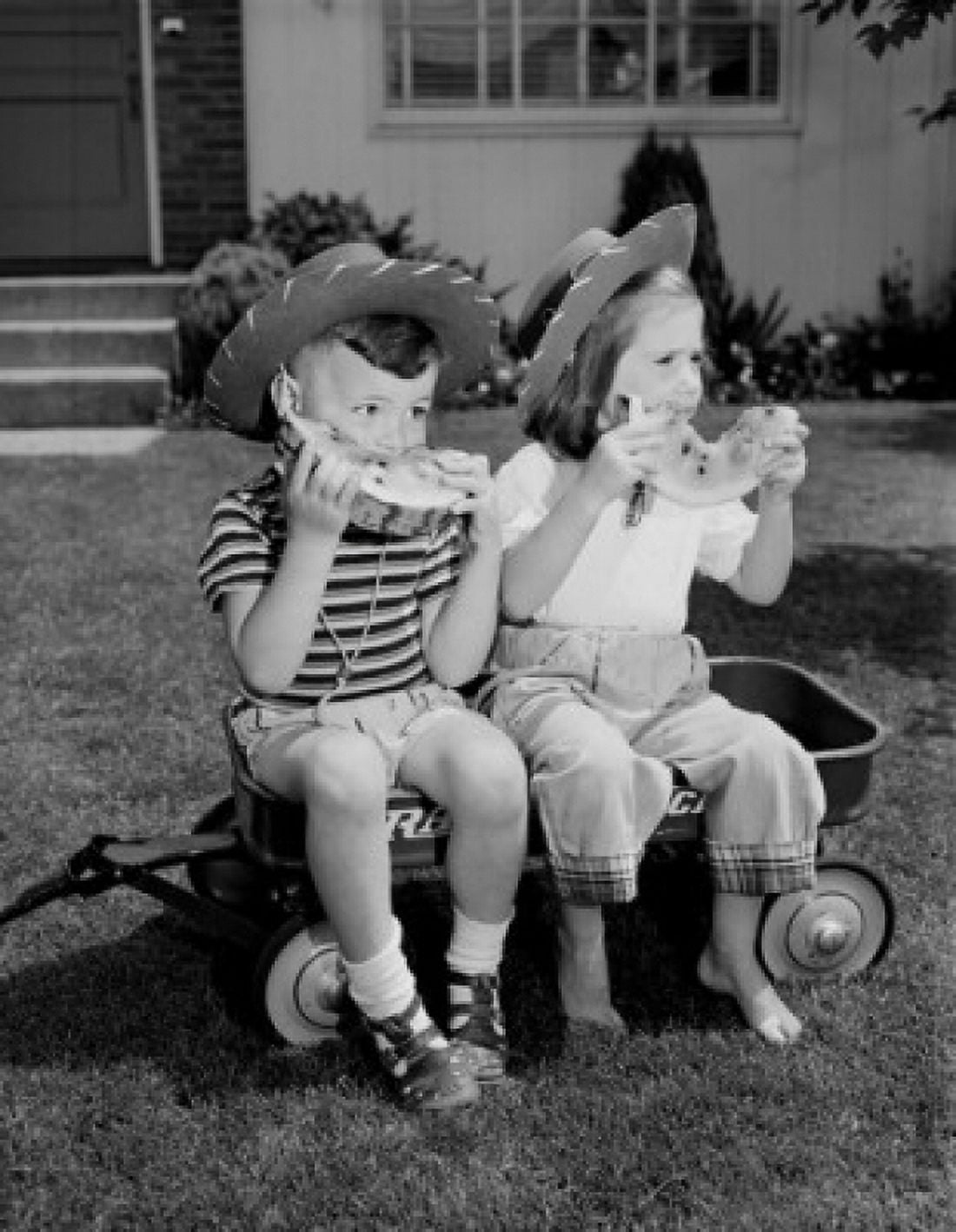 Kids eating watermelon Canvas Art - (24 x 36)