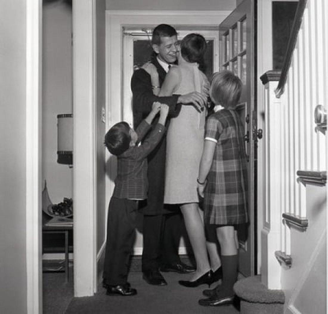 Kids with mother greeting father coming back home Canvas Art - (18 x 24)