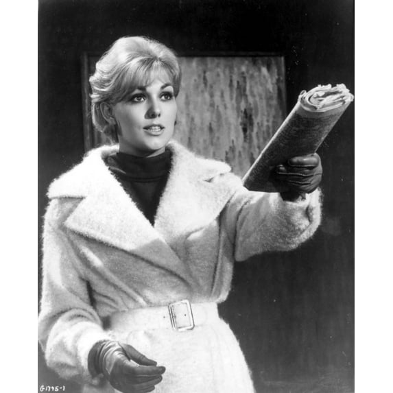 Kim Novak holding a newspaper Photo Print (24 x 30)