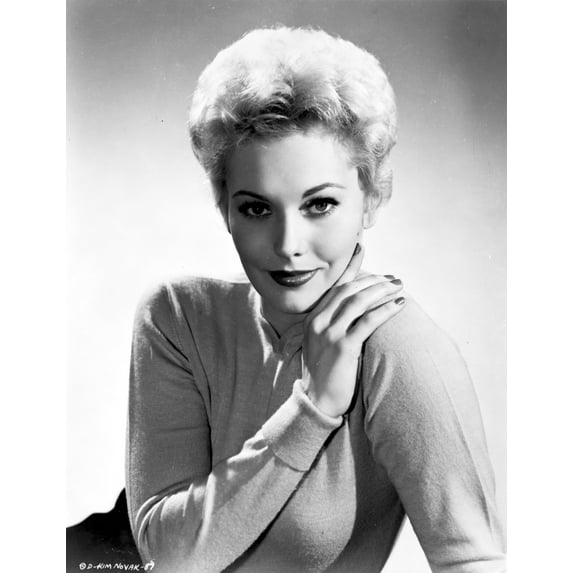 Kim Novak posing Photo Print (8 x 10)