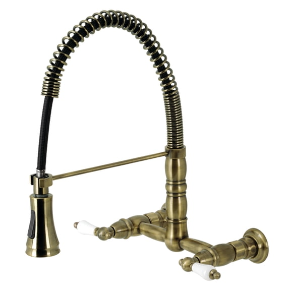Kingston Brass GS1243PL Heritage Double-Handle 2-Hole Wall-Mount Pre-Rinse Bridge Kitchen Faucet in Antique Brass