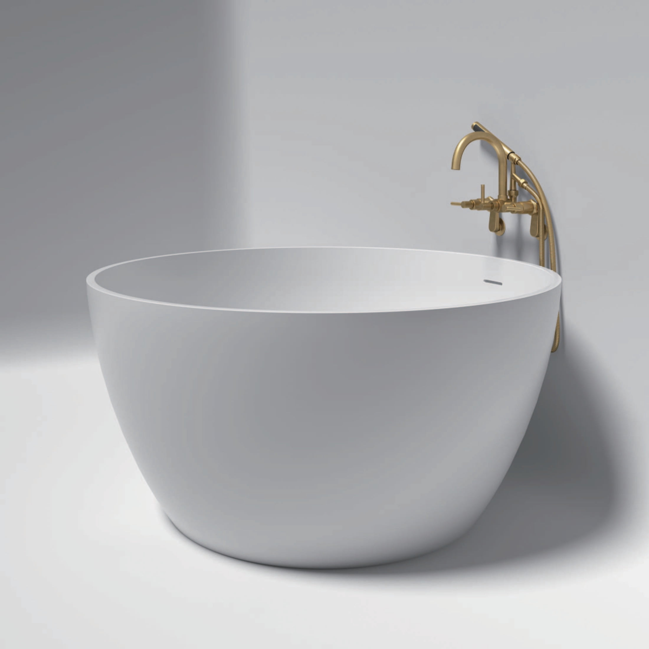 Kingston Brass KRTRO4545157DL 45-Inch Solid Surface Round Double Ended Freestanding Tub with Faucet Combo and Drain in Brushed Brass