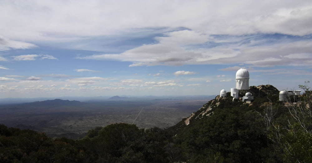 Kitt Peak Observatory domes and surrounding area Canvas Art - Phillip JonesStocktrek Images (20 x 11)