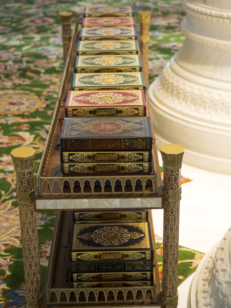 Korans on shelf in Sheikh Zayed Bin Sultan Al Nahyan Grand Mosque Abu Dhabi United Arab Emirates Canvas Art - Panoramic Images (12 x 16)