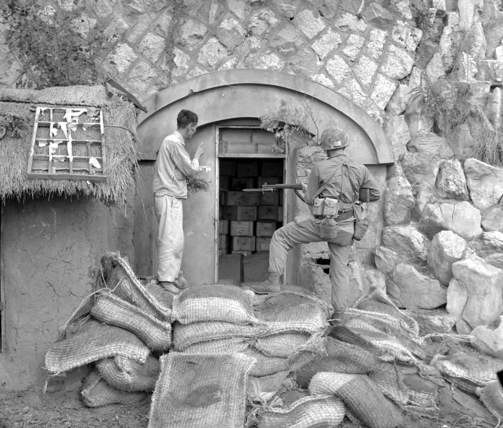 Korean civilian shows U S Marine dynamite cache near Inchon South Korea Canvas Art - Stocktrek Images (30 x 26)