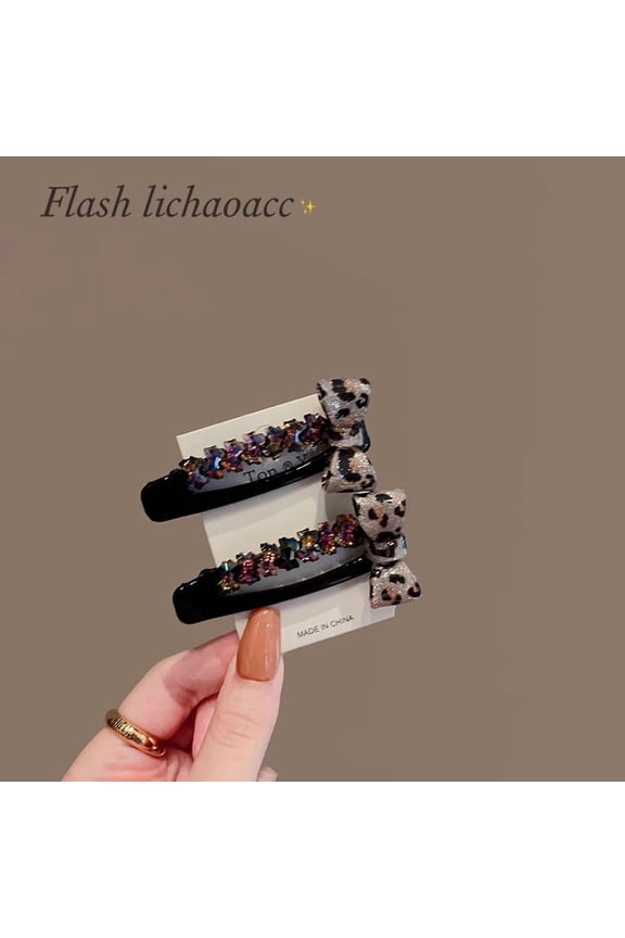 Korean-style Dongdaemun fashion leopard print bow hair clip with rhinestone edges, women's high-end bangs and flyaway hair barrette