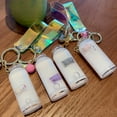 thumbnail image 1 of Kripyery Floating Milk Pig Key Chain Drift Bottle Glass Holographic Lanyard Bell Key Pendant Decoration, 1 of 8