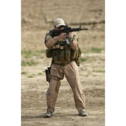 Kunduz, Afghanistan - U.S. Contractor firing a 5.56mm M4 Carbine Poster Print (11 x 17)