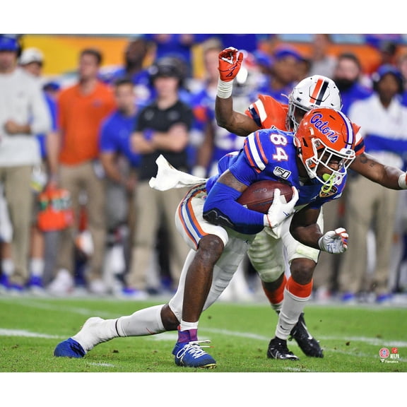 Kyle Pitts Florida Gators Unsigned Breaking Tackle Photograph