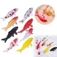 thumbnail image 1 of LAIOWEI Miniature Koi Fish Figurines, Small Plastic Fish, Fake Goldfish Decorations for DIY Fish Tank Dollhouse Miniature Garden Realistic Carp Statues for Creative Landscaping 1Pcs, 1 of 6