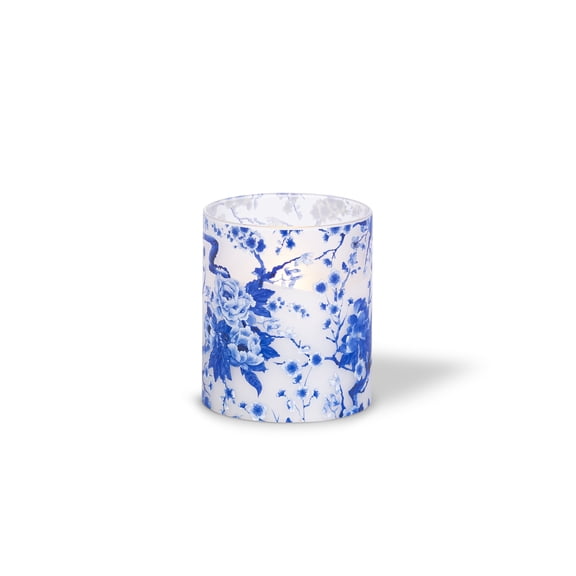 LED 3.5"D X 4"H Hand-Poured Wax Candle w/ Blue Floral Design. Next Gen LED Flame Patented Technology w/ Adjustable Brightness Control. 2 C Batteries (Not Included). Multi Timer Function, 4, 6 & 8 hr