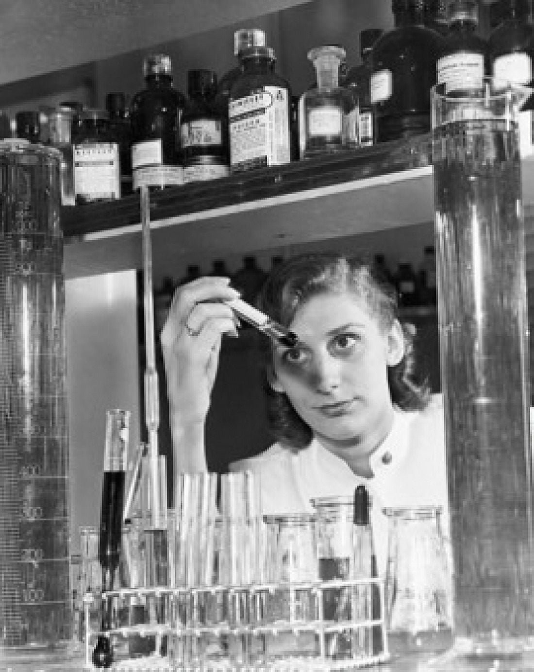 Lab technician observing a solution in a test tube in a laboratory Canvas Art - (24 x 36)