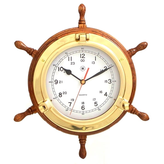 Lacquered Brass Porthole Quartz Clock with Ship's Wheel on Oak Wood.