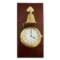 thumbnail image 1 of Lacquered Brass Porthole Quartz Striking Bell Clock on Mahogany Wood., 1 of 1