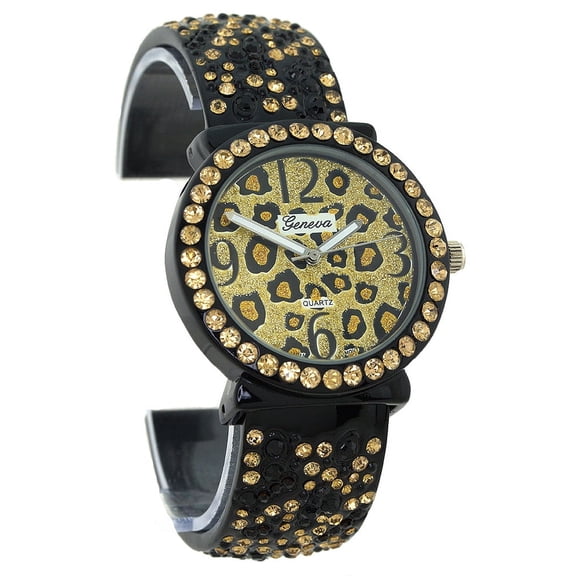 Ladies Leopard Print Party Clubbing cuff Watch 39mm 10mm thick case. Leopard Print Dial, 20mm wide Silver-Tone metal cuff florial hinged bracelet fits 7 inches wrist