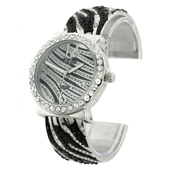 Ladies Silver-tone CZ Zebra stripe cuff watch 35mm 10mm thick case.cz bezel, 20mm wide silver-tone black zebra stripe fits 7 inches wrist.
