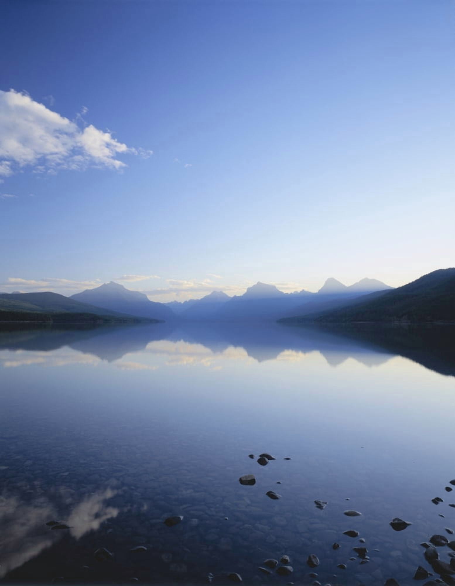 Lake McDonald and the Rocky Mountains at sunrise in Glacier National Park Montana Canvas Art - Panoramic Images (27 x 9)