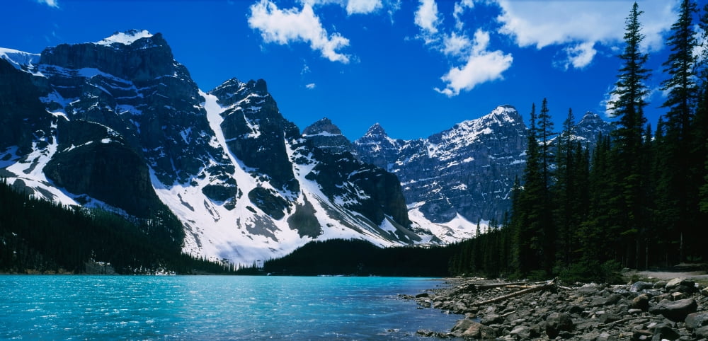 Lake in front of snowcapped mountains Moraine Lake Alberta Canada Canvas Art - Panoramic Images (36 x 12)