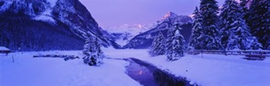 Lake in winter with mountains in the background Lake Louise Banff National Park Alberta Canada Canvas Art - Panoramic Images (36 x 12)