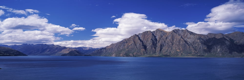 Lake with mountain range in the background Lake Hawea Otago Region South Island New Zealand Canvas Art - Panoramic Images (12 x 36)
