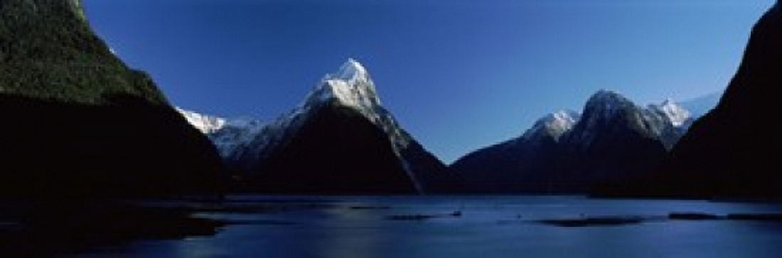 Lake with mountains in the background Milford Sound Fiordland National Park South Island New Zealand Canvas Art - Panoramic Images (18 x 6)