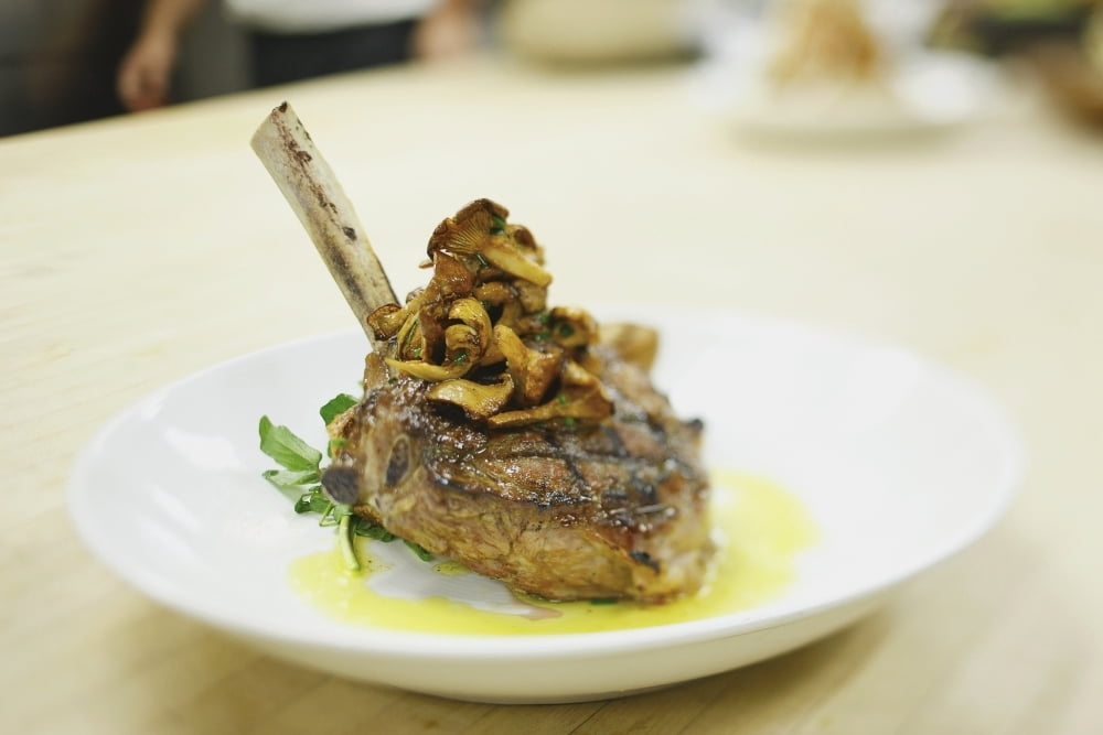 Lamb chop on a plate in a restaurant boston massachusetts usa Canvas Art - Eric Kulin Design Pics (19 x 12)