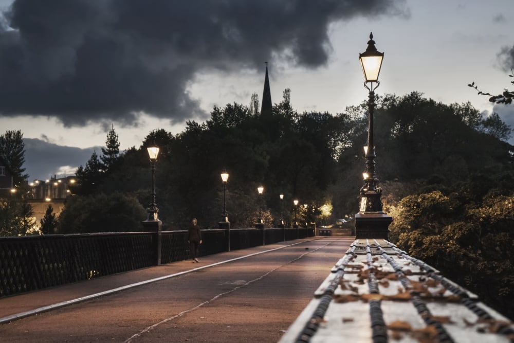 Lamp posts along a street at dusk Newcastle Tyne and Wear England Canvas Art - John Short Design Pics (19 x 12)