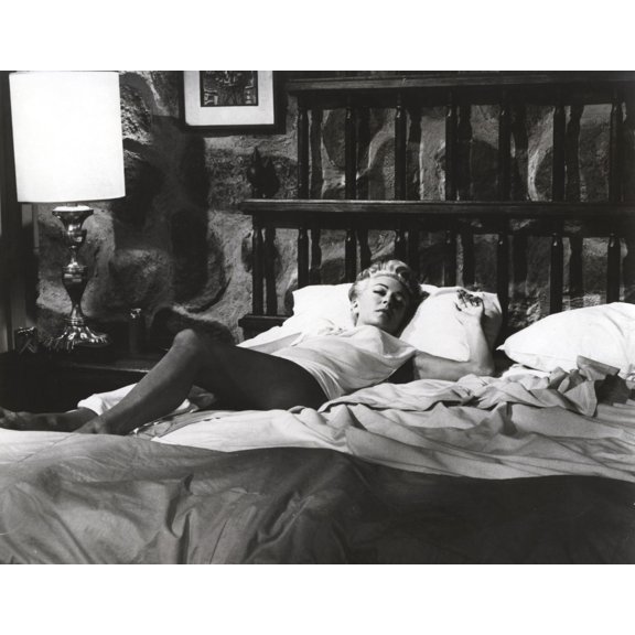 Lana Turner Lying on Bed Portrait Photo Print (8 x 10)
