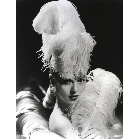 Lana Turner posed in Feathery Dress with Black Background Photo Print (24 x 30)