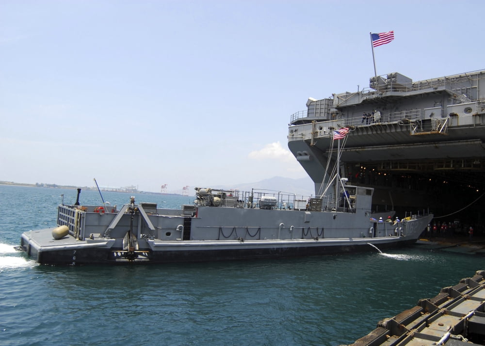 Landing Craft Utility moving into position near amphibious assault ship USS Essex in Subic Bay Philippines Canvas Art - Stocktrek Images (34 x 24)