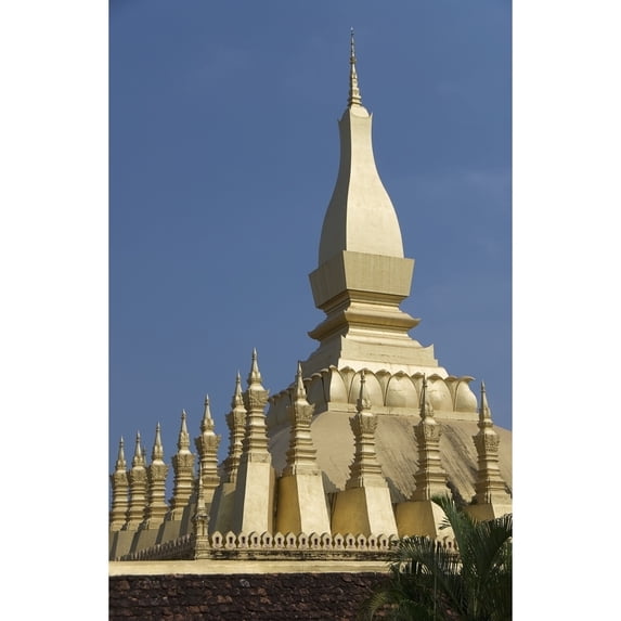 Laos, Vientiane, Pha That Luang, Architectural detail of a golden rooftop. Poster Print (12 x 19)