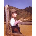 thumbnail image 1 of Laramie Cast Leaning on Wood in Cowboy Outfit Photo Print (8 x 10), 1 of 1