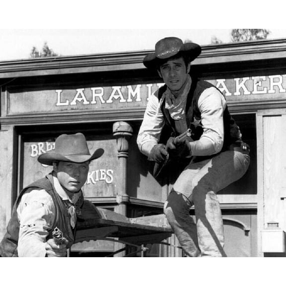 Laramie Robert Fuller John Smith with guns in action pose 8x10 inch photo