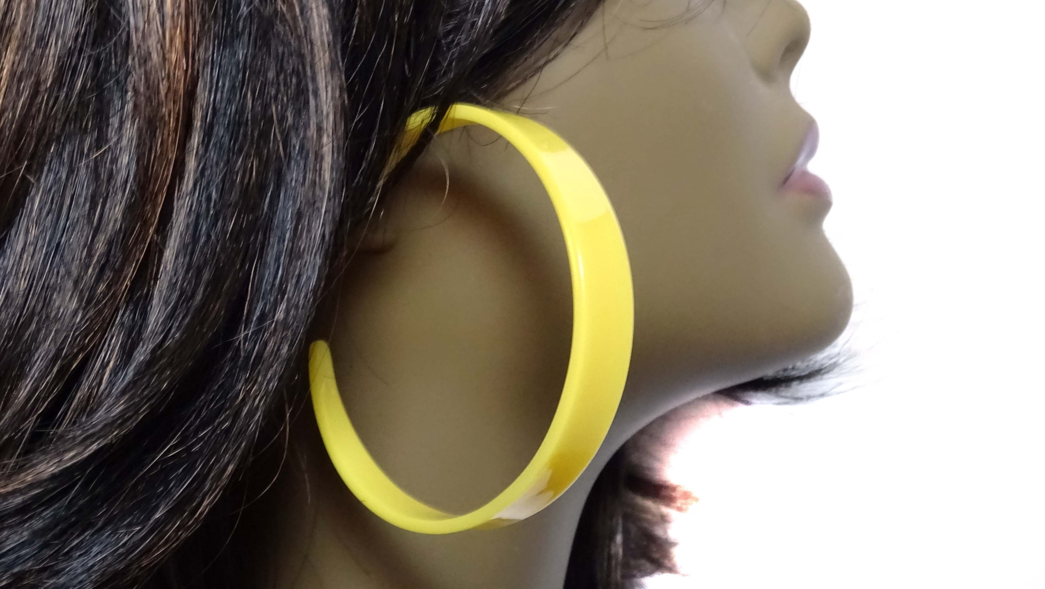 Yellow plastic shop hoop earrings