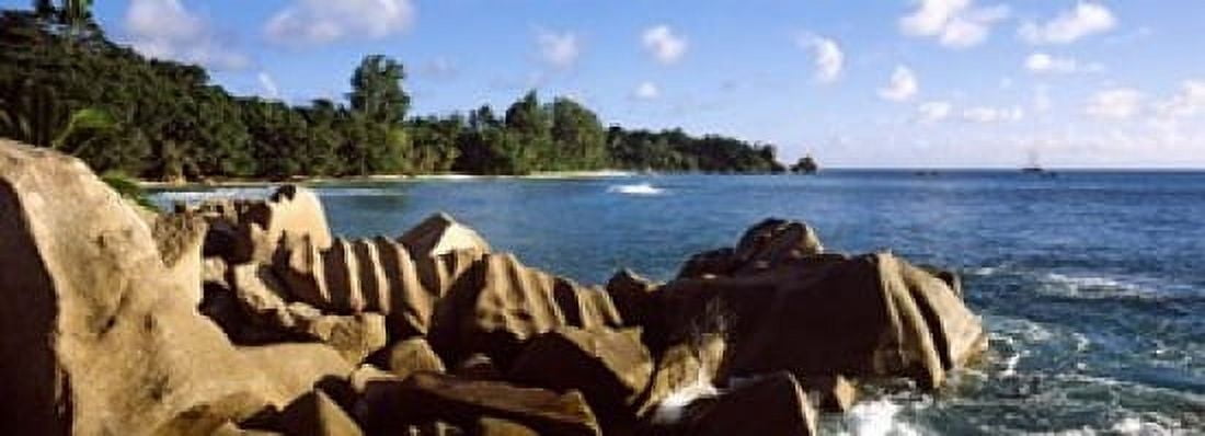 Large granite rocks on the shoreline of La Digue Island Seychelles Canvas Art - Panoramic Images (18 x 7)