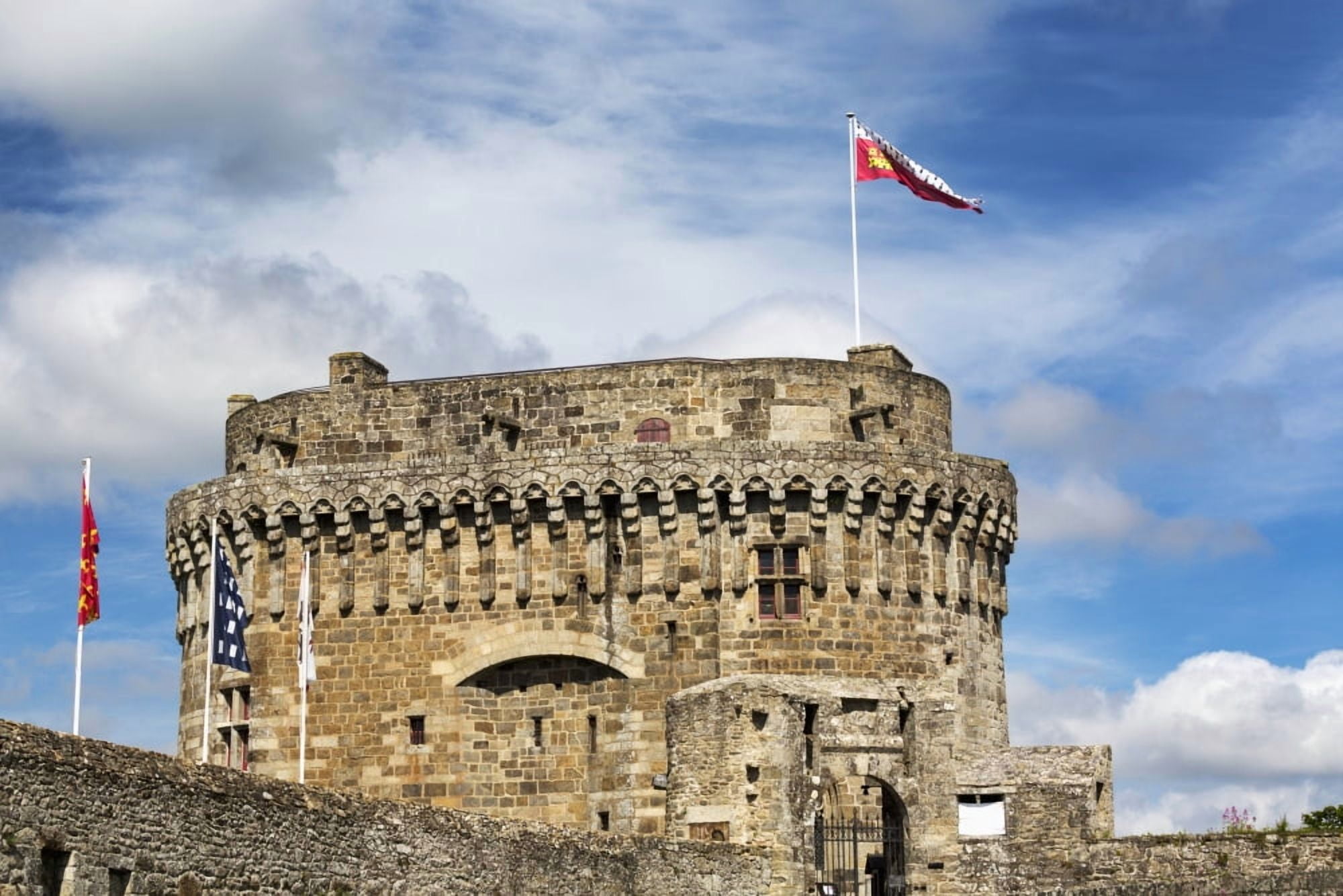 Large stone fort with colourful flags on top with blue sky and clouds Dinan Brittany France Canvas Art - Michael Interisano Design Pics (19 x 12)