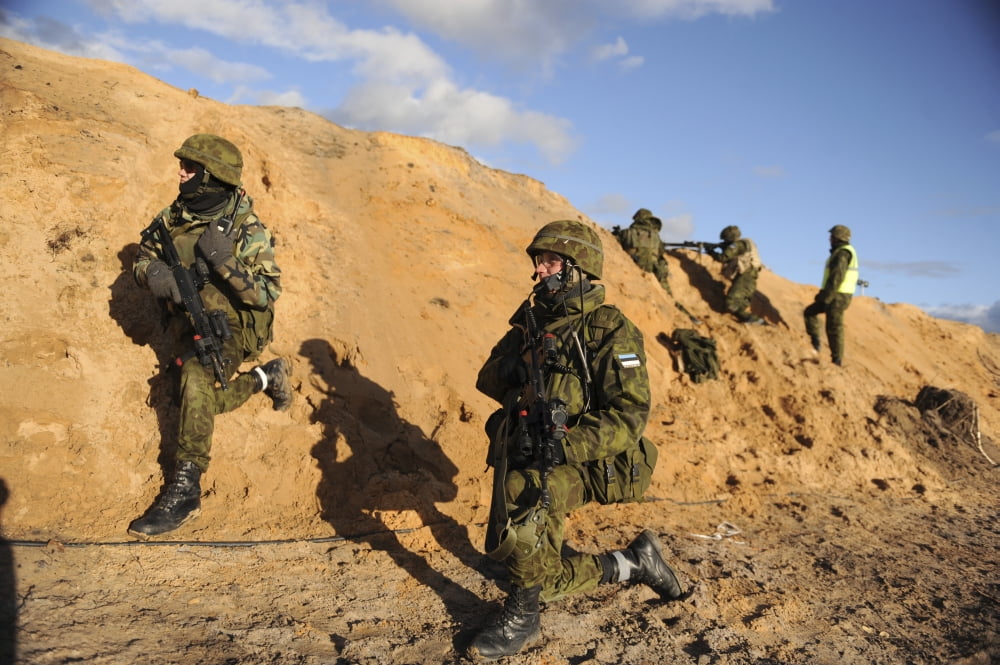 Latvian soldiers train at an Estonian checkpoint in Adazi Training Area Latvia Canvas Art - Stocktrek Images (34 x 23)