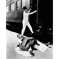 thumbnail image 1 of Laurel and Hardy Stan steps on Ollie whilst boarding train poster 4x6 photo, 1 of 1