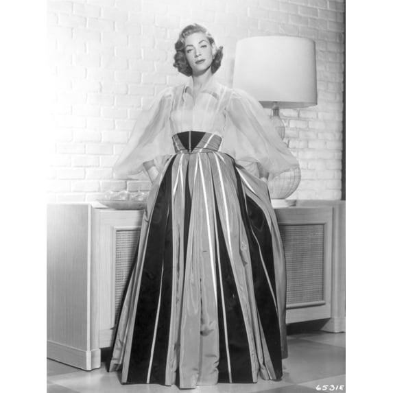 Lauren Bacall wearing a striped dress Photo Print (24 x 30)