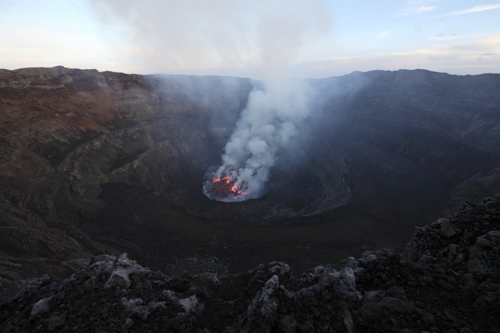 Lava Lake in bottom of summit caldera Nyiragongo Volcano Democratic Republic of the Congo Canvas Art - Richard RoscoeStocktrek Images (35 x 23)