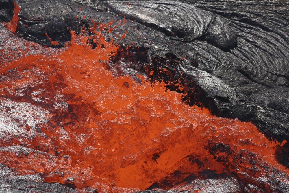 Lava bursting at edge of active lava lake Erta Ale volcano Danakil Depression Ethiopia Canvas Art - Richard RoscoeStocktrek Images (35 x 23)