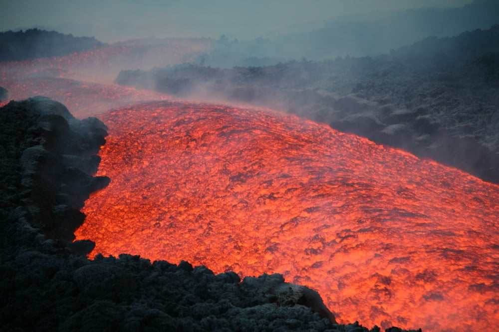 Lava flow during eruption of Mount Etna volcano Sicily Italy Canvas Art - Richard RoscoeStocktrek Images (18 x 12)