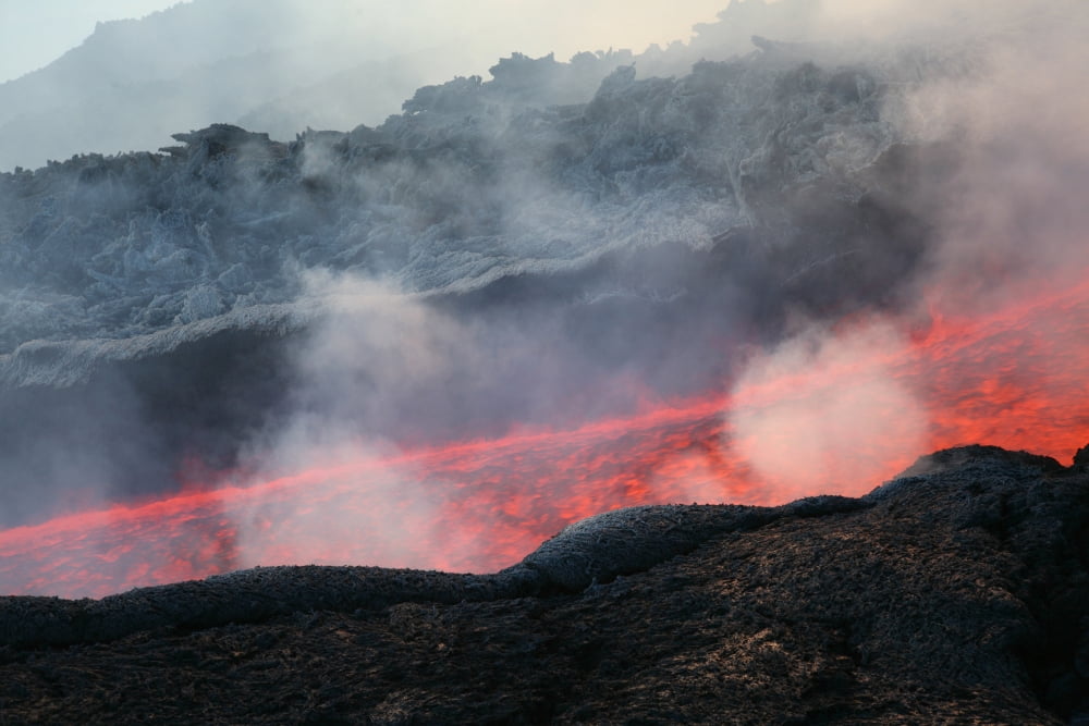 Lava flow during eruption of Mount Etna volcano Sicily Italy Canvas Art - Richard RoscoeStocktrek Images (35 x 23)