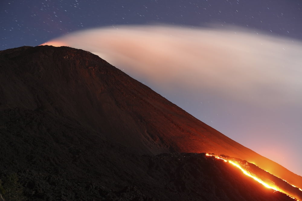 Lava flowing from a small lava shield on the flank of Pacaya volcano Guatemala Canvas Art - Richard RoscoeStocktrek Images (35 x 23)