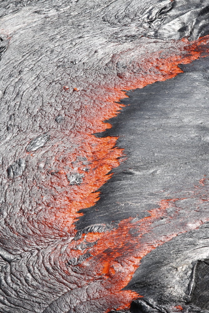 Lava flowing from under crust of lava lake Erta Ale volcano Danakil Depression Ethiopia Canvas Art - Richard RoscoeStocktrek Images (12 x 18)